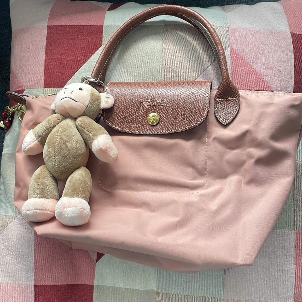 Longchamp Pink Tote with Plush Monkey Charm